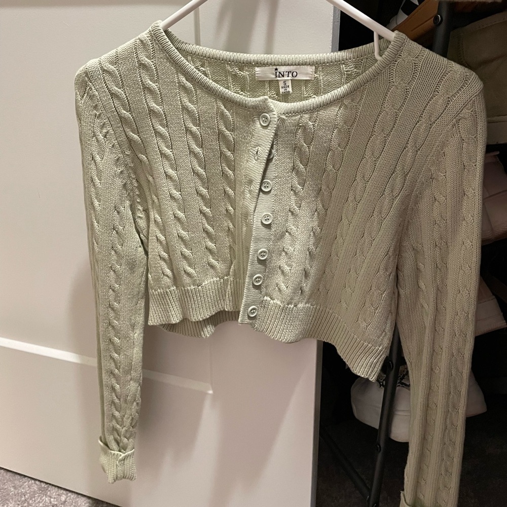 Cropped cable knit cardigan